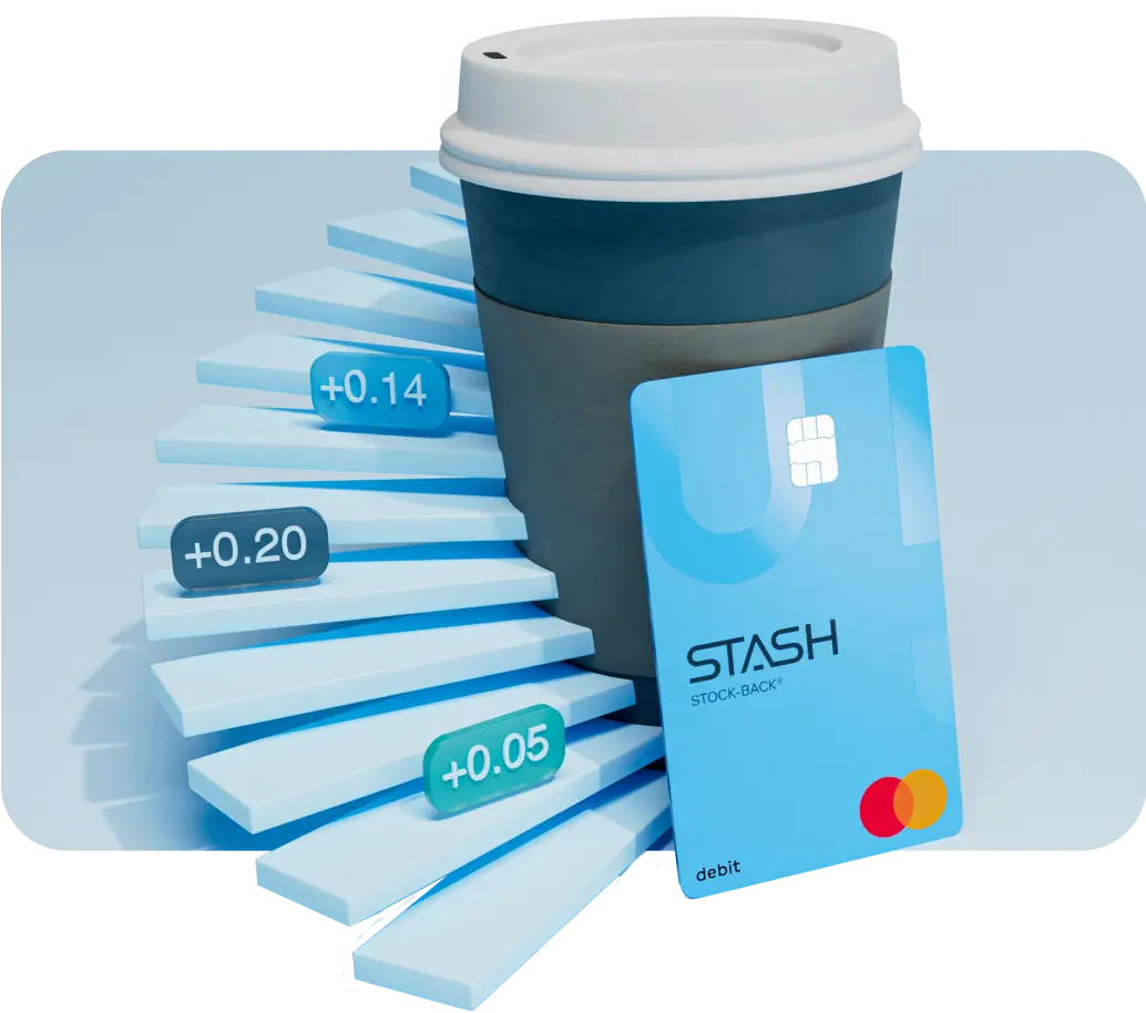 A coffee cup with a Stash debit card leaning against it.